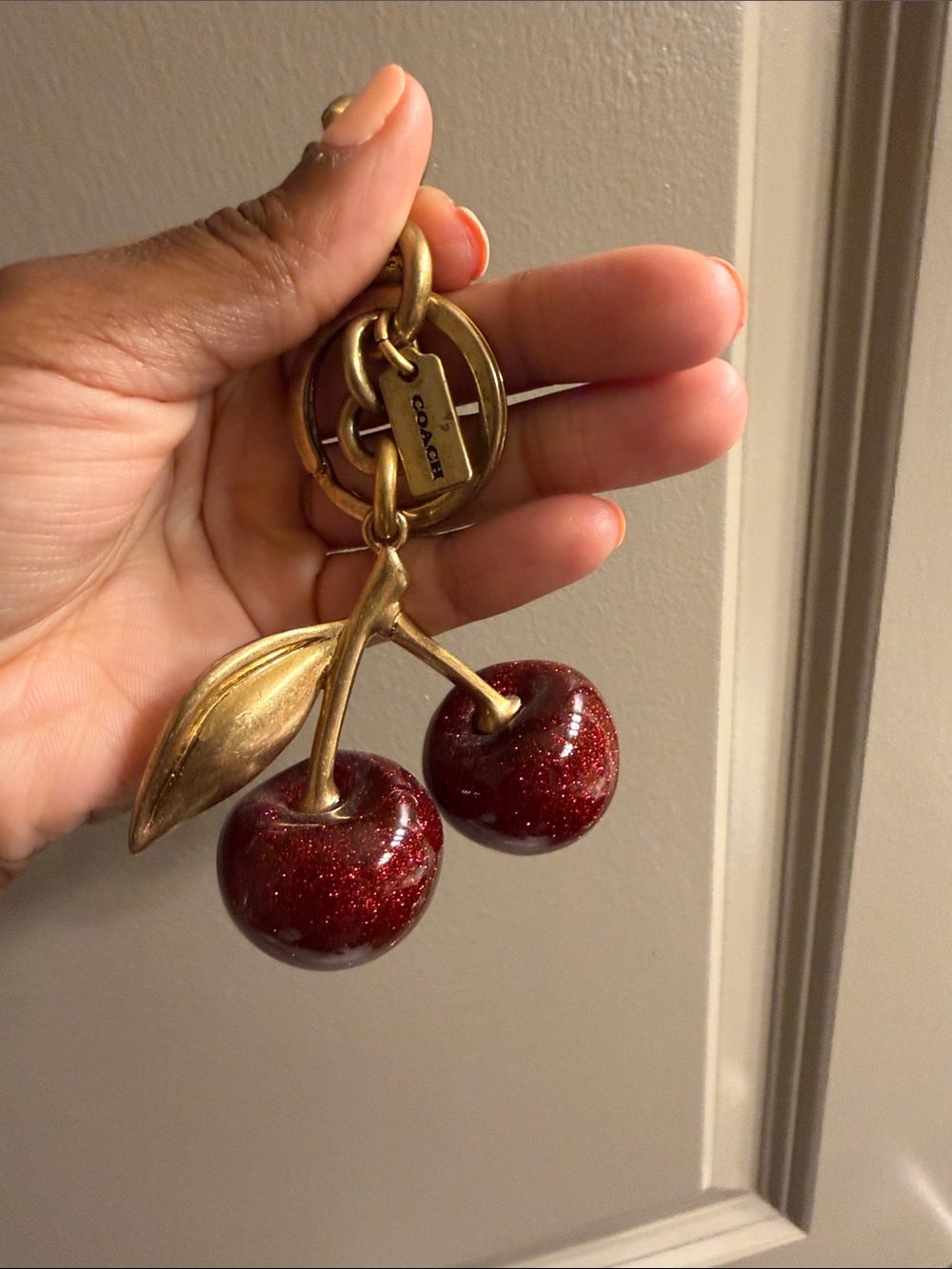 Coach Glitter Cherry Bag Charm in Deep Red and Gold